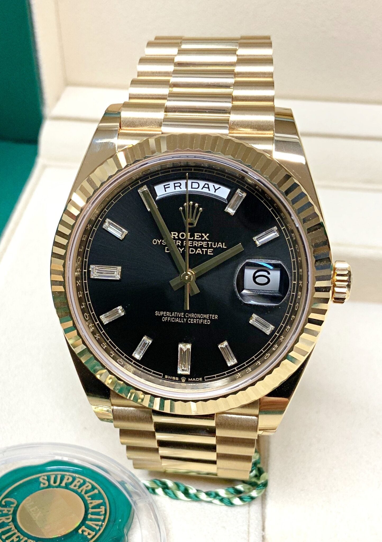 Rolex Day-Date Yellow Gold baguette black dial