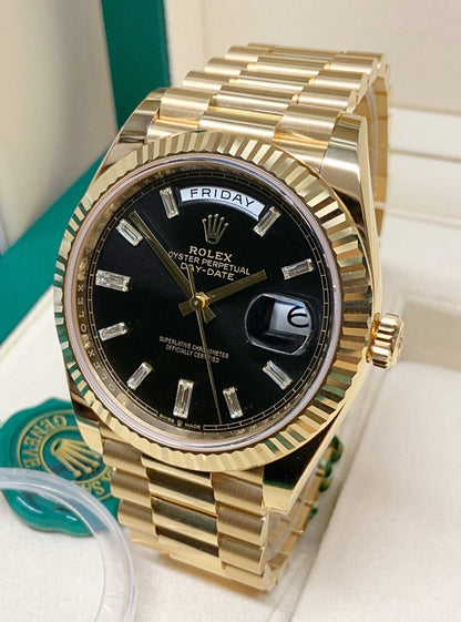 Rolex Day-Date Yellow Gold baguette black dial