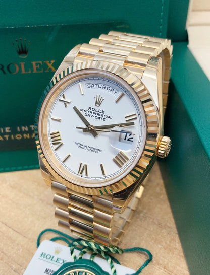 Rolex Day-Date Yellow Gold roman white dial